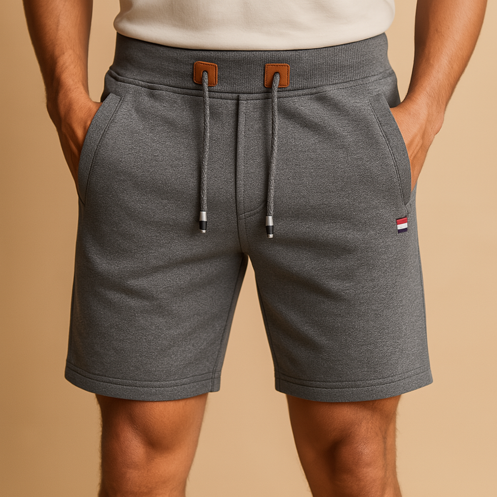 Men’s breathable sports shorts with elastic waistband, multiple pockets, and lightweight design, perfect for daily wear, travel, and outdoor activities.