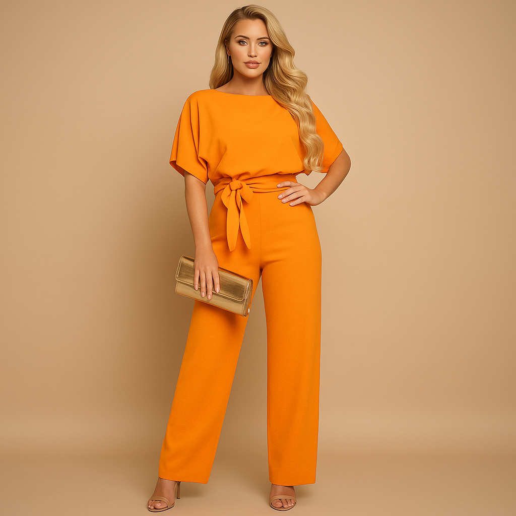 Glamorous glitter halter jumpsuit for women with open back and flared legs, perfect for parties, galas, and festive occasions.