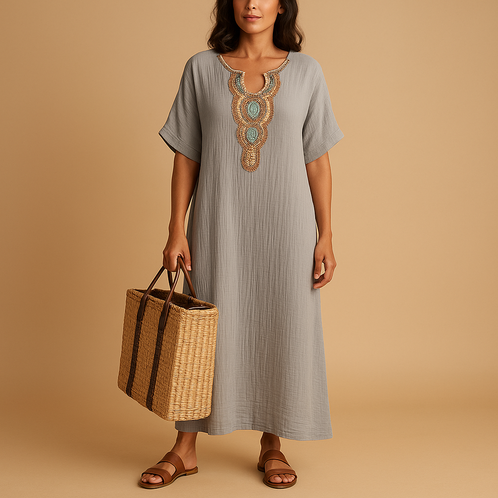 Light kaftan dress for women with a flowy fit and breathable fabric, perfect for summer beach days and elegant occasions.
