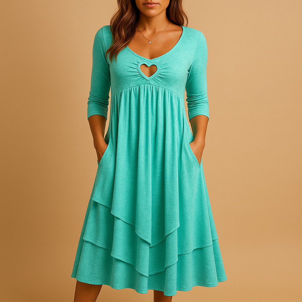 Women’s long A-line dress with O-neckline, long sleeves, pockets, and subtle ruffle details. Perfect for work, casual days, or formal occasions.