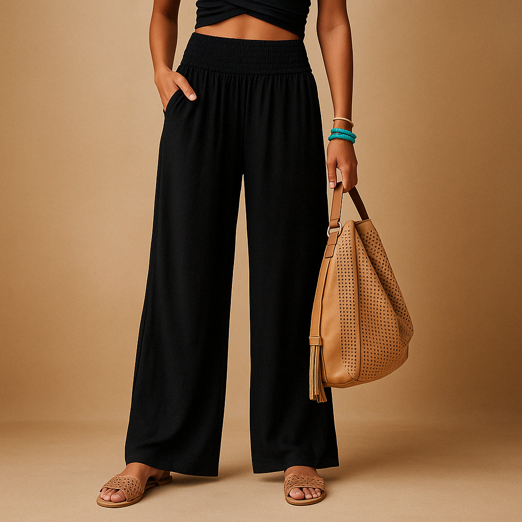 Women’s loose summer pants with elastic waistband and wide straight legs, lightweight breathable fabric, perfect for casual summer days.
