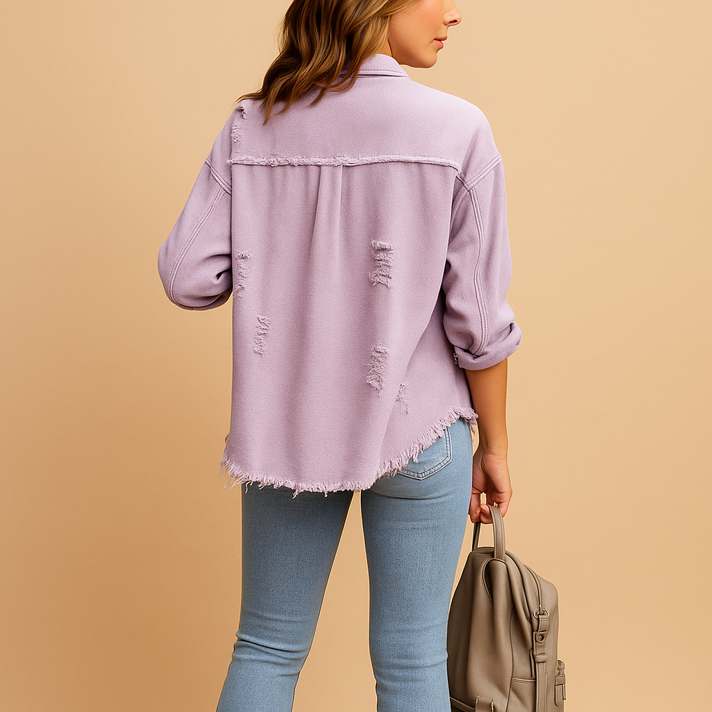 Oversized vintage denim jacket for women with distressed details and relaxed fit, perfect for casual wear and trendy city looks.