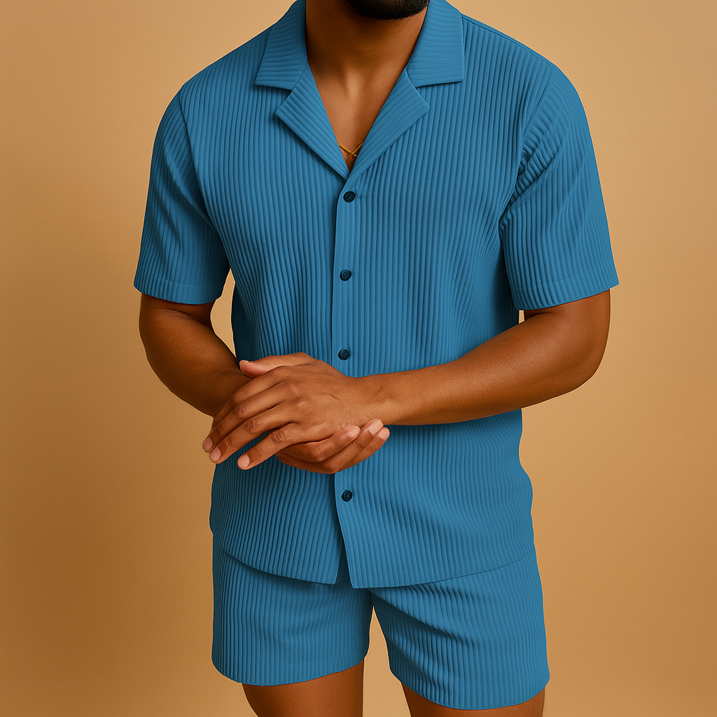Men’s two piece summer outfit with lightweight fabric, refined button details, and clean finishes. Available in Natural, Olive Green, Beige, and Black.