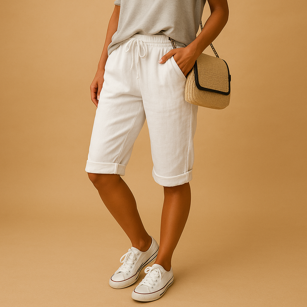 Women’s casual capri pants with relaxed fit, elastic waist and drawstring, rolled-up hem, airy fabric. Perfect for spring and summer outfits.