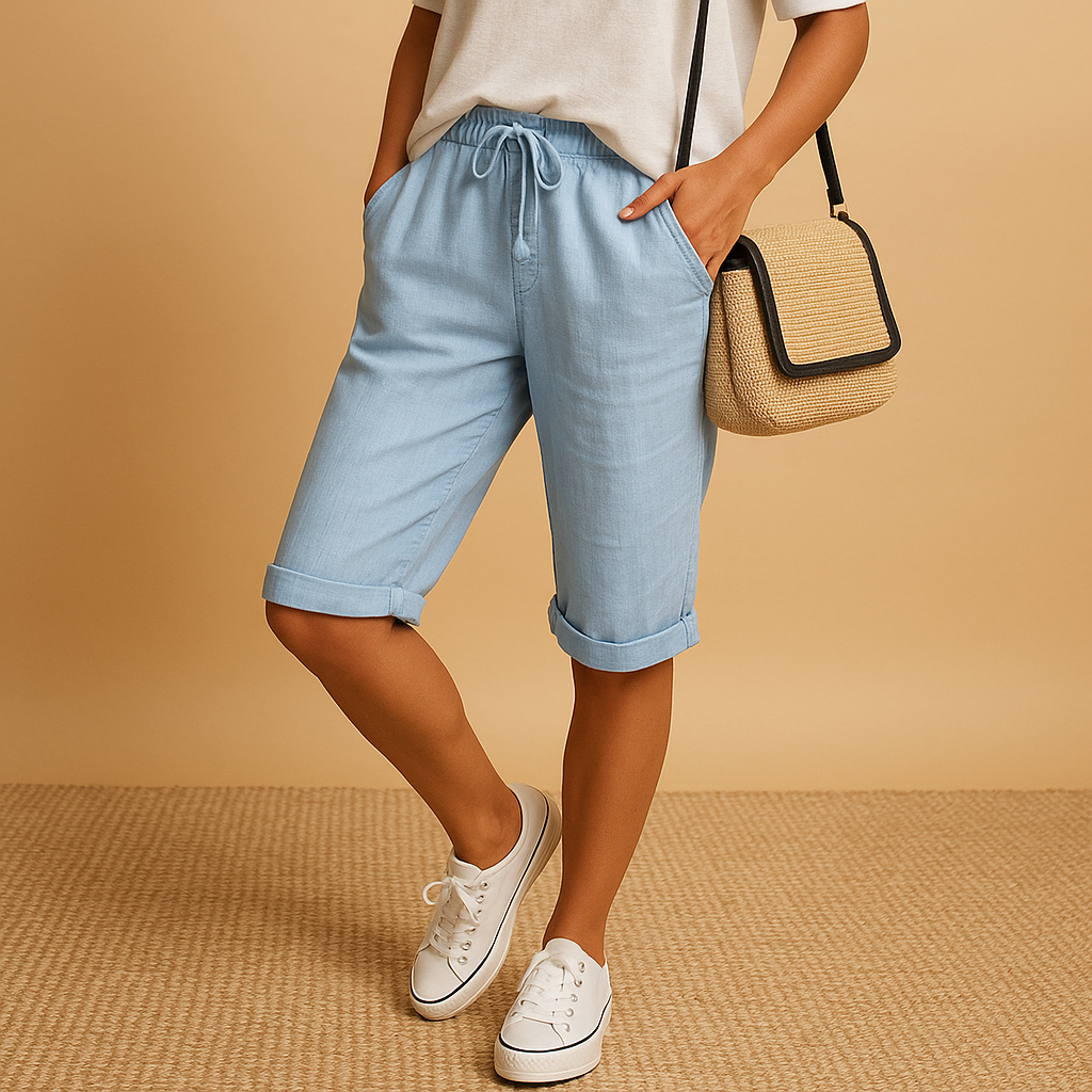 Women’s casual capri pants with relaxed fit, elastic waist and drawstring, rolled-up hem, airy fabric. Perfect for spring and summer outfits.