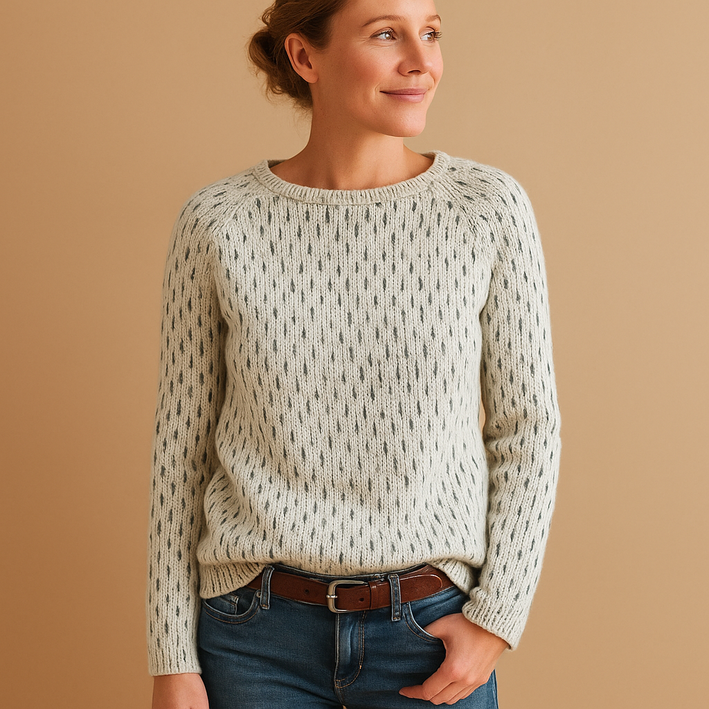 Women’s elegant knitted winter sweater in timeless grey with relaxed fit, breathable fabric, and classic design for casual or office wear.