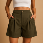 Women’s elegant summer shorts with flattering fit and double button detail, versatile for brunch, garden parties, or stylish everyday outfits.