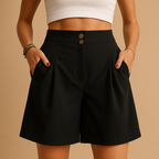 Women’s elegant summer shorts with flattering fit and double button detail, versatile for brunch, garden parties, or stylish everyday outfits.