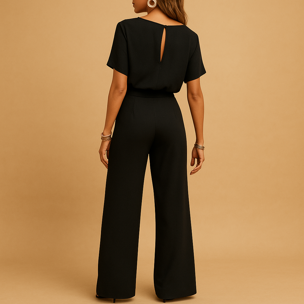 Women’s elegant tailored jumpsuit with fitted waist and flowing sleeves, ideal for weddings, galas, and formal evening events.
