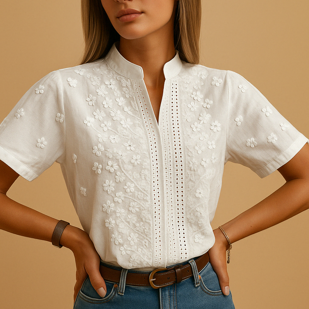 Women’s elegant white blouse with classic collar and button closure, perfect for office wear, casual outings, or evening occasions.