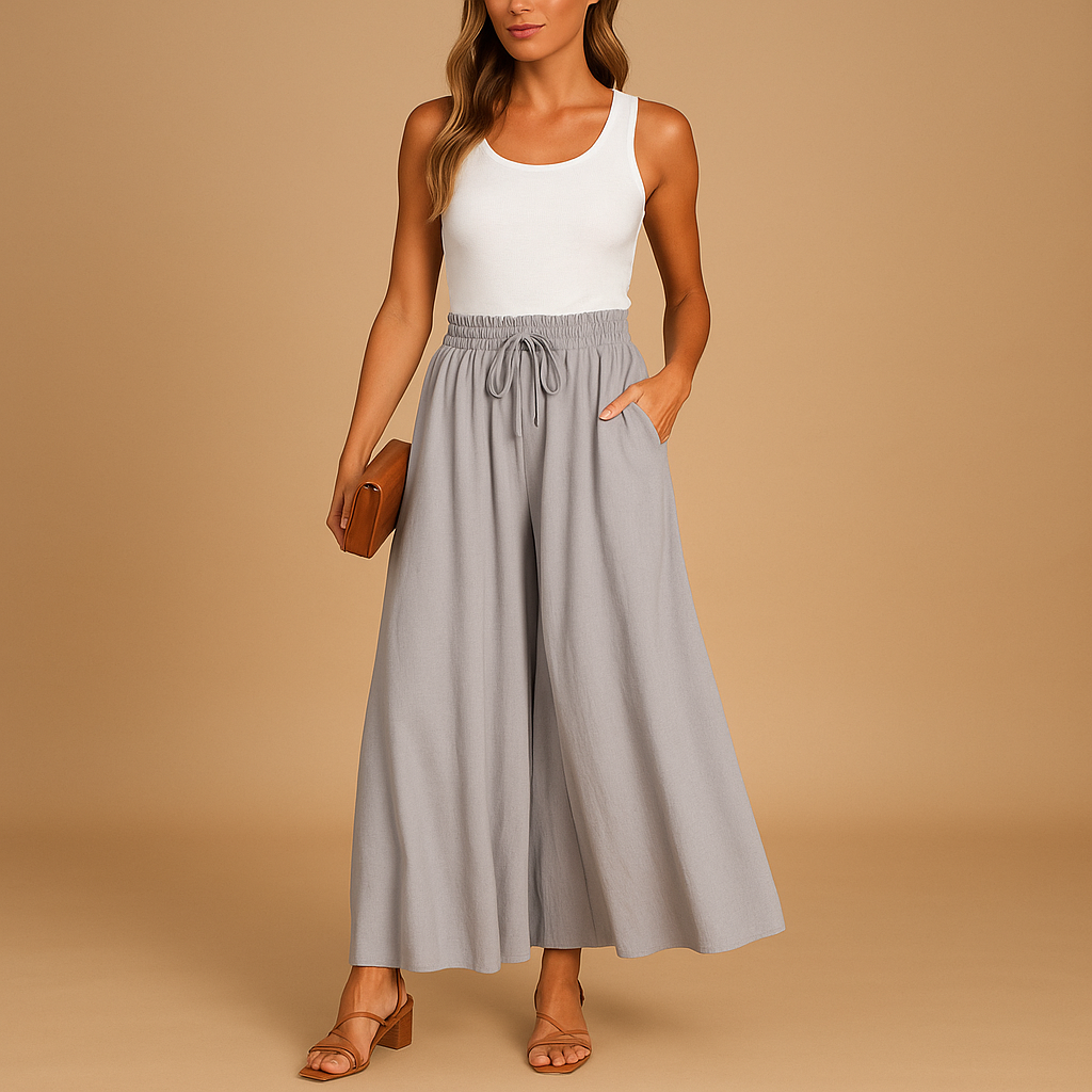 Women’s high-waist wide-leg trousers with elastic waistband and modern chic design, ideal for work, casual days, and elegant outfits.