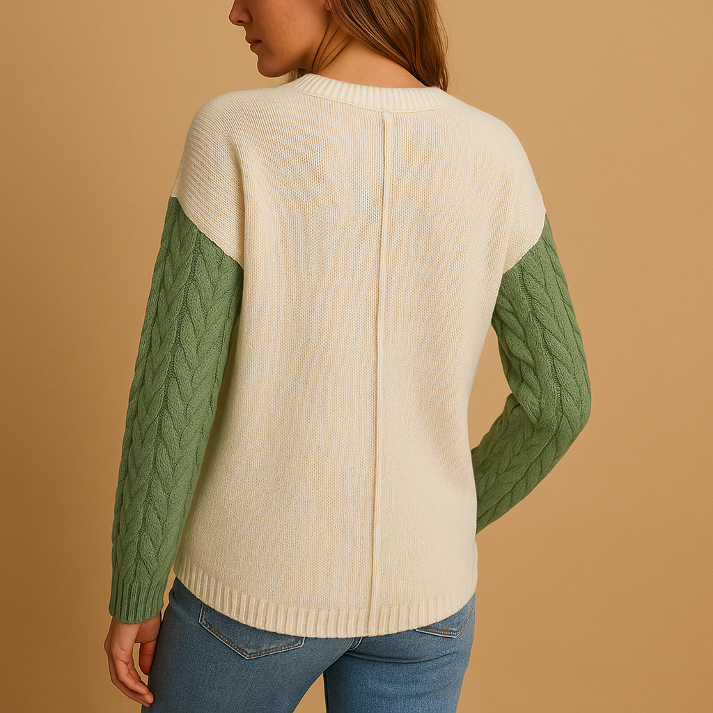 Women’s knit sweater with cable pattern, dropped shoulders, and pocket detail. Relaxed fit, versatile style, perfect for casual or cozy outfits.