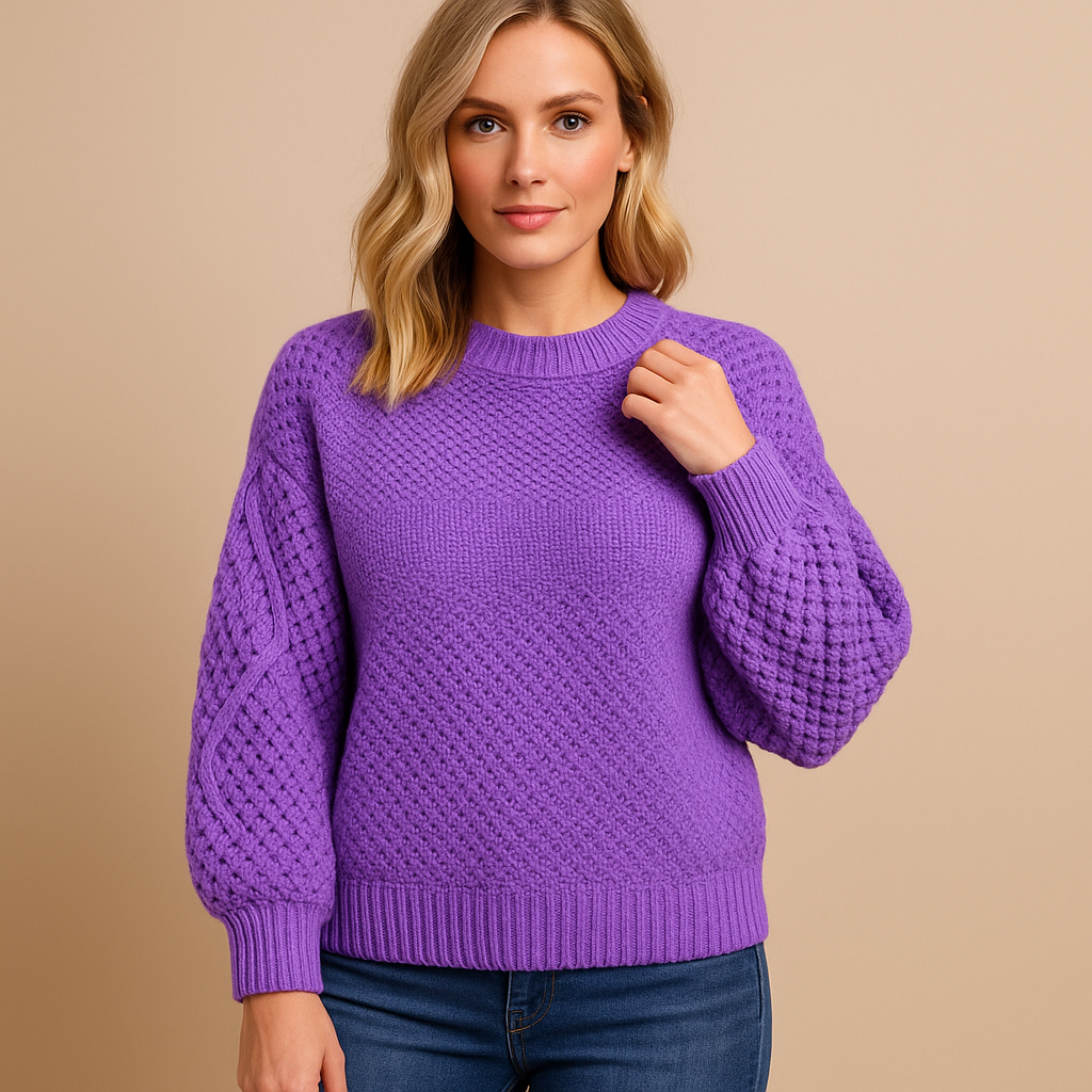Women’s knitted winter sweater with tailored relaxed fit, soft lightweight fabric, and minimalist design in neutral tones for casual or formal wear.