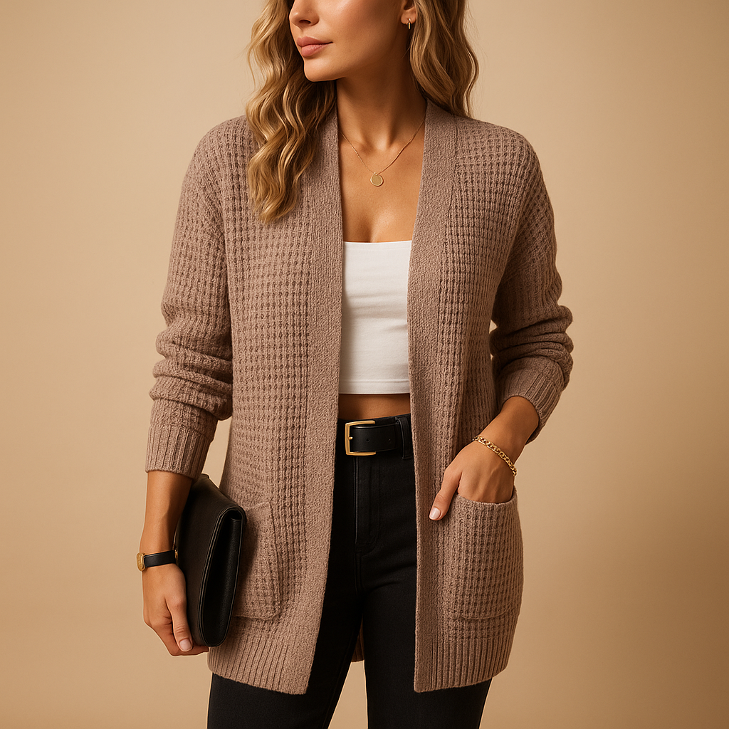 Long cardigan with v-neck for women featuring a relaxed fit, practical pockets, and soft breathable fabric. Perfect for casual or office wear.