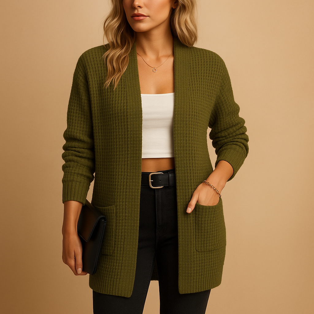 Long cardigan with v-neck for women featuring a relaxed fit, practical pockets, and soft breathable fabric. Perfect for casual or office wear.