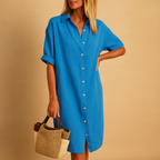 Women’s long shirt dress with short sleeves and loose fit, available in black, green, blue, and red. Perfect for casual, work, or party looks.