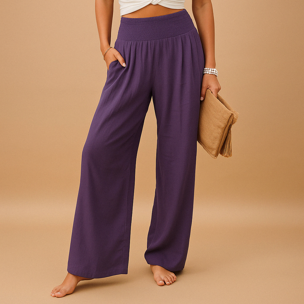 Women’s loose summer pants with elastic waistband and wide straight legs, lightweight breathable fabric, perfect for casual summer days.