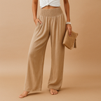 Women’s loose summer pants with elastic waistband and wide straight legs, lightweight breathable fabric, perfect for casual summer days.