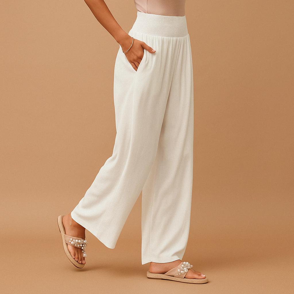 Women’s loose summer pants with elastic waistband and wide straight legs, lightweight breathable fabric, perfect for casual summer days.