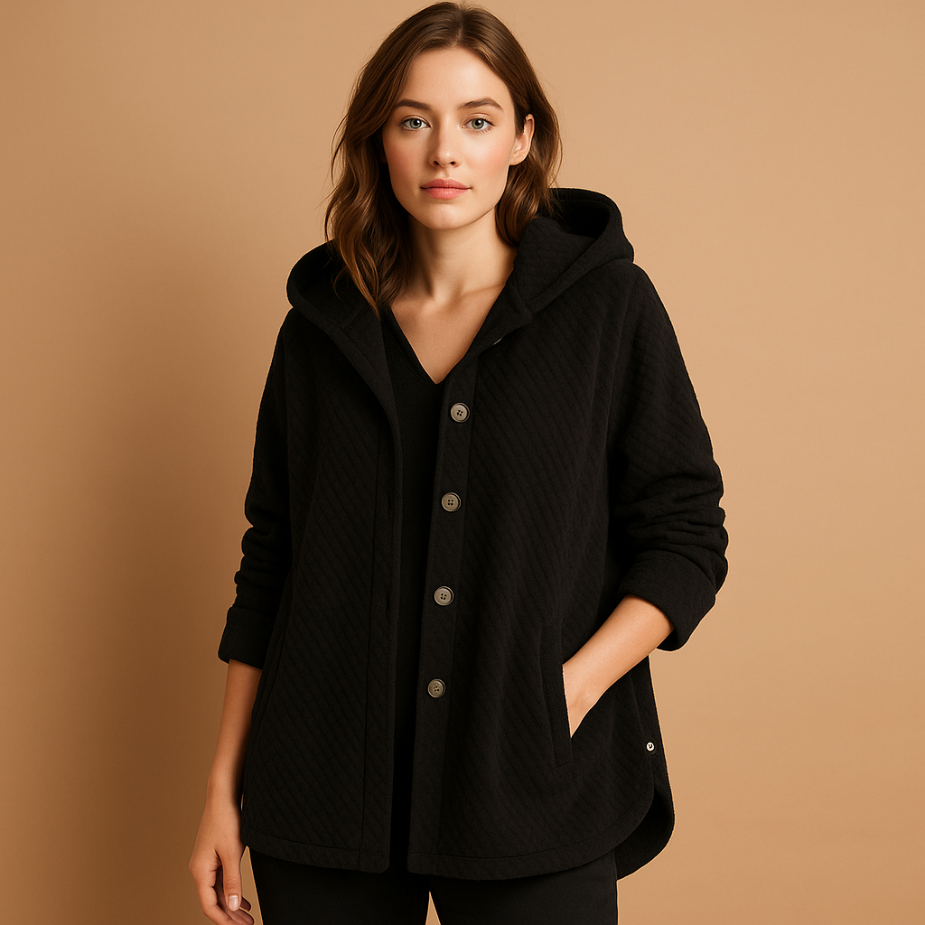 Women’s reversible fleece jacket with hood and ribbed sleeves in soft tones, tailored fit for autumn and winter casual comfort and style.