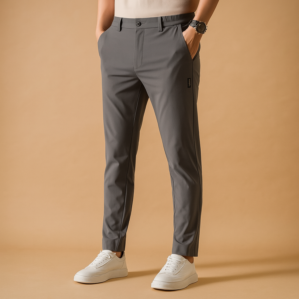 Men’s slim fit sport pants with breathable, quick-drying material and subtle stitching, ideal for workouts, travel, or casual wear.