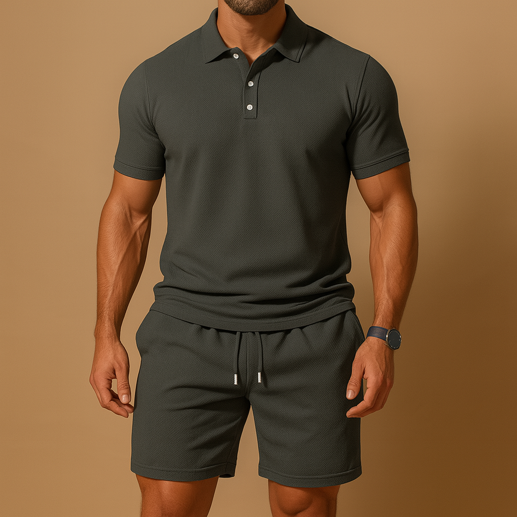 Sporty men’s polo summer set with cord detail, breathable fabric, and relaxed fit. Available in Black, Blue, and Khaki, perfect for leisure or active days.